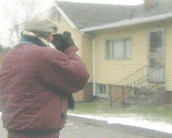 Photographing a house.
